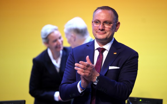 epa13085354 Alternative for Germany (AfD) party and faction co-chairman Tino Chrupalla (R) applauds next to co-chairwoman Alice Weidel (L) during the AfD federal party congress in Erfurt, Germany, 04  ...