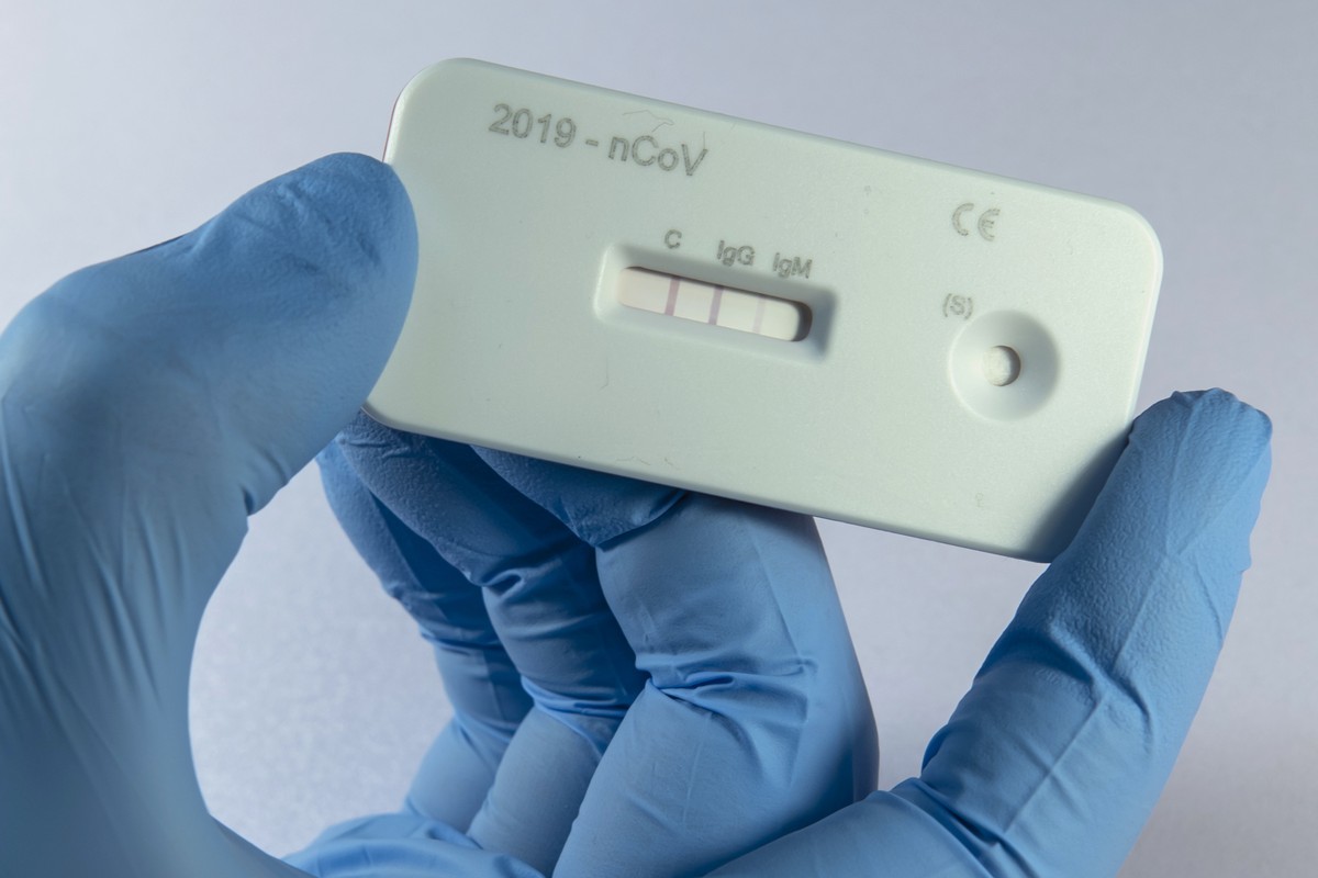 A scientist presents an antibody test for coronavirus in a laboratory of the Leibniz Institute of Photonic Technology (Leibniz IPHT) at the InfectoGnostics research campus in Jena, Germany, Friday, Ap ...