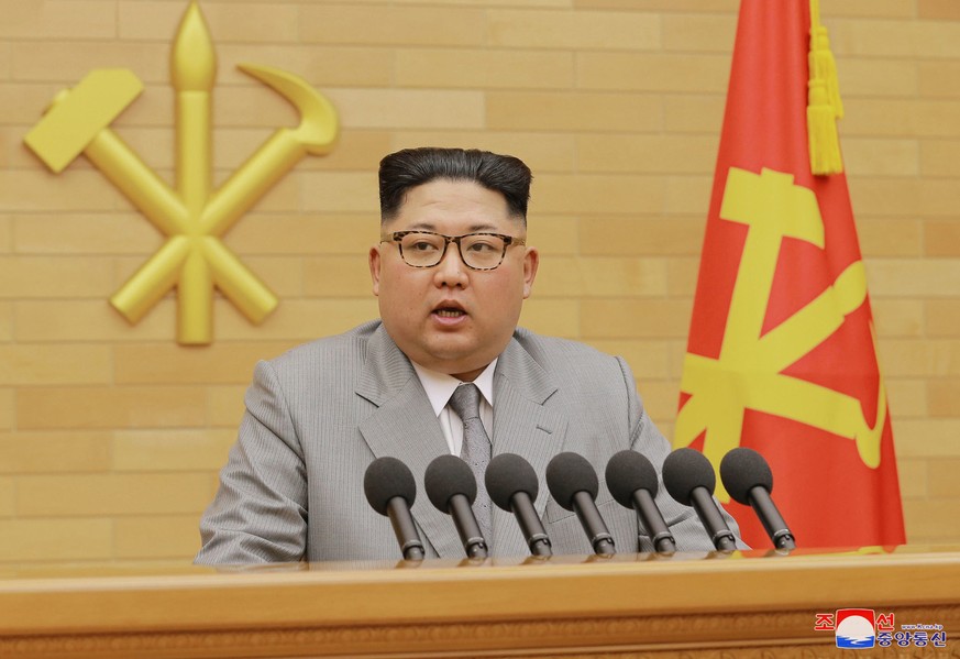 In this photo provided by the North Korean government, North Korean leader Kim Jong Un delivers his New Year&#039;s speech at an undisclosed place in North Korea Monday, Jan. 1, 2018. Kim said Monday  ...
