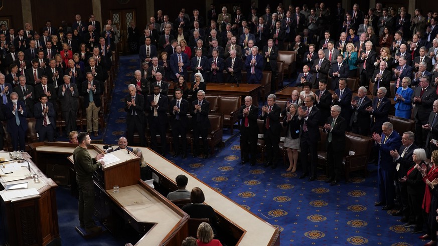 Ukrainian President Volodymyr Zelenskyy addresses Congress during his first trip outside his country since Russia invaded in February, at the Capitol in Washington, Wednesday, Dec. 21, 2022. (AP Photo ...