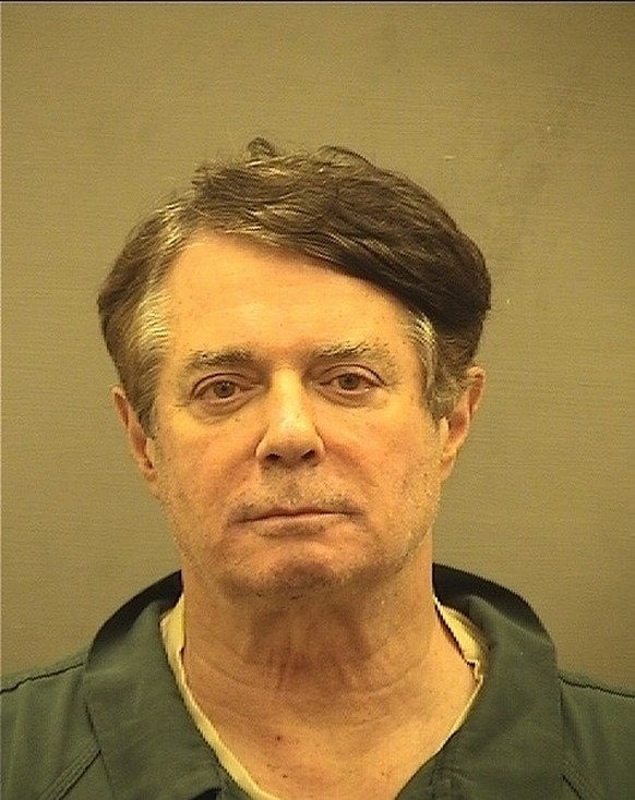 epa06884191 A handout photo made available by the Alexandria Virginia Sheriff&#039;s Office shows former Trump campaign chairman Paul Manafort mug shot, Alexandria, Virginia, USA (issued 12 July 2018) ...