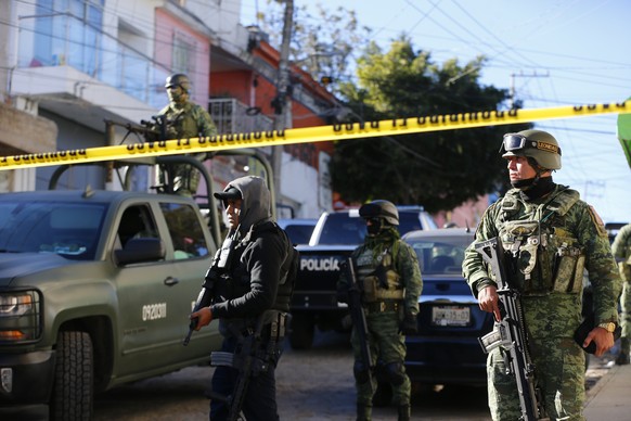epaselect epa11165123 Members of the Mexican Army guard the area where an armed attack took place early 18 February, in the municipality of Tlaquepaque, in Jalisco, Mexico, 18 February 2024. At least  ...