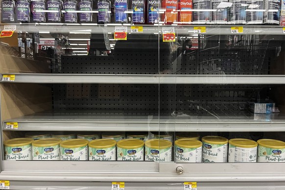 epa09959390 The shelves containing baby formula are empty in a supermarket in East Los Angeles, California, USA, 19 May 2022. The US President on 18 May invoked the Defense Production Act for baby for ...