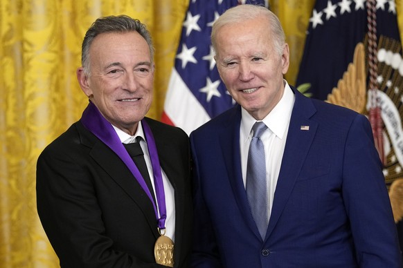 President Joe Biden presents the 2021 National Medal of the Arts to Bruce Springsteen at the White House in Washington, Tuesday, March 21, 2023. (AP Photo/Susan Walsh) Joe Biden