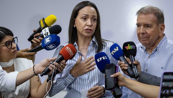 epa11413455 Former deputy Maria Corina Machado speaks during a press conference in Caracas, Venezuela, 15 June 2024. The Vente Venezuela (VV) party, led by opposition member María Corina Machado, deno ...