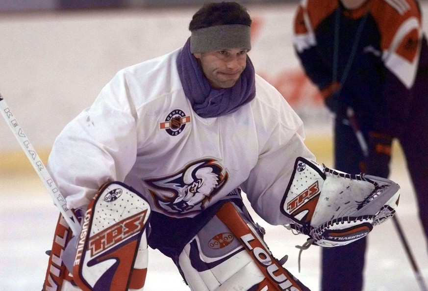 Buffalo Sabres goalie Dominik Hasek skates in full goalie equipment under the watch of his trainer, Josef Bruk, at the Pepsi Center in Amherst, N.Y., Tuesday, Jan. 18, 2000. Hasek, who suffered an inj ...