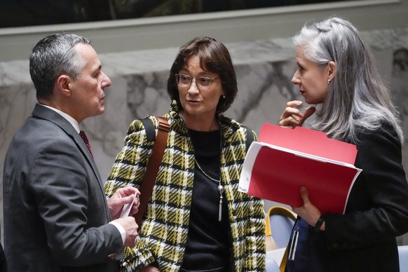 Ignazio Cassis, Federal Councillor for Foreign Affairs of Switzerland and current president of the United Nations Security Council, left, closes a meeting of the council alongside Pascale Baeriswyl, P ...