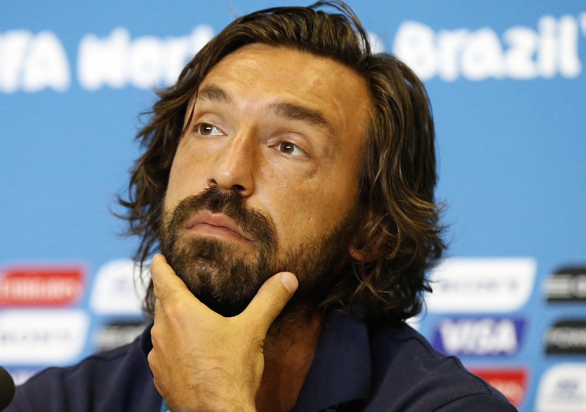 Italy's national soccer player Andrea Pirlo attends a news conference before their training session at the Dunas Arena soccer stadium in Natal June 23, 2014. Italy will face Uruguay on June 24. R ...