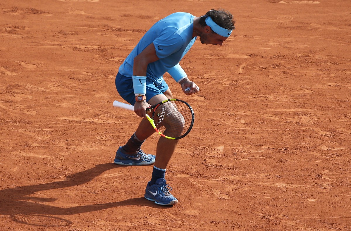 Spain's Rafael Nadal reacts as he defeats Argentina's Juan Martin Del Potro during their semifinal match of the French Open tennis tournament at the Roland Garros stadium, Friday, June 8, 20 ...