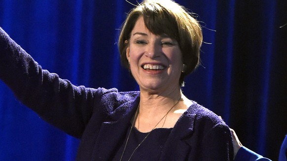 FILE - In this Nov. 6, 2018, file photo, Sen. Amy Klobuchar waves to supporters after winning re-election during the Democratic election night party in St. Paul, Minn. Klobuchar will be in Iowa on Sat ...