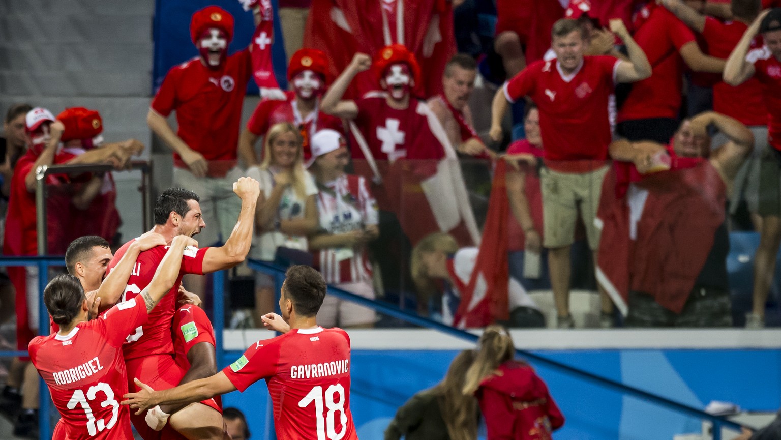 Switzerland&#039;s midfielder Blerim Dzemaili, celebrates after scoring a goal with team mates during the FIFA World Cup 2018 group E preliminary round soccer match between Switzerland and Costa Rica  ...