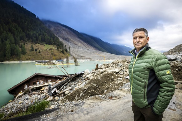 Matthias Bellwald, mayor of the municipality of Blatten poses looks into the camera, 4 months after a landslide destroyed the village, in Blatten, Switzerland, on Wednesday, October 1, 2025. On May 28 ...