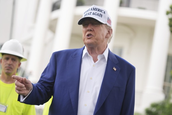 President Donald Trump speaks as a flag pole is installed on the South Lawn of the White House, Wednesday, June 18, 2025, in Washington. (AP Photo/Evan Vucci)
Donald Trump