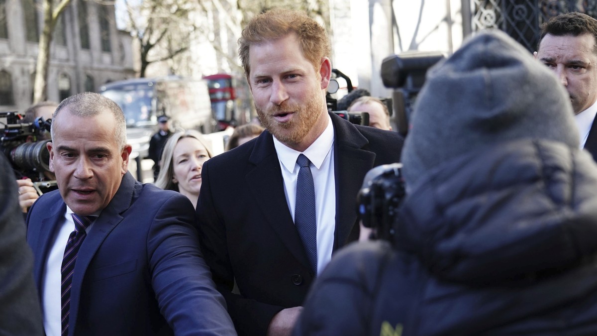 Britain's Prince Harry, center, arrives at the Royal Courts Of Justice, in London, Monday, March 27, 2023. Prince Harry was in a London court on Monday as the lawyer for a group of British tabloi ...