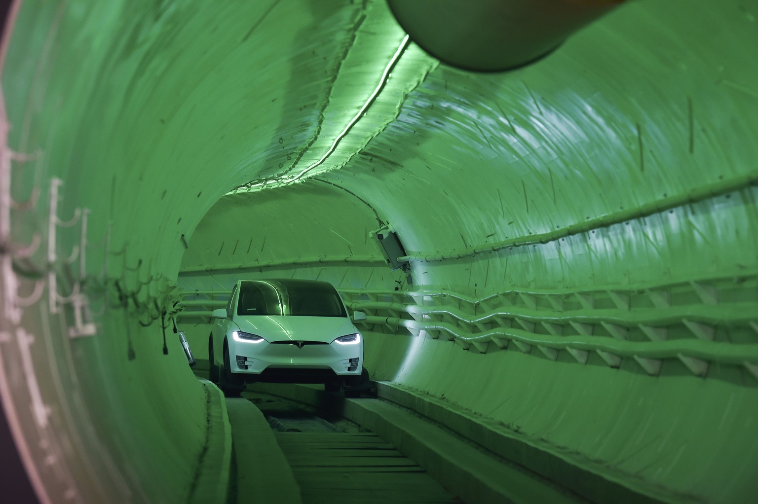 Elon Musk, co-founder and chief executive officer of Tesla Inc., arrives in a modified Tesla Model X electric vehicle during an unveiling event for the Boring Company Hawthorne test tunnel in Hawthorn ...