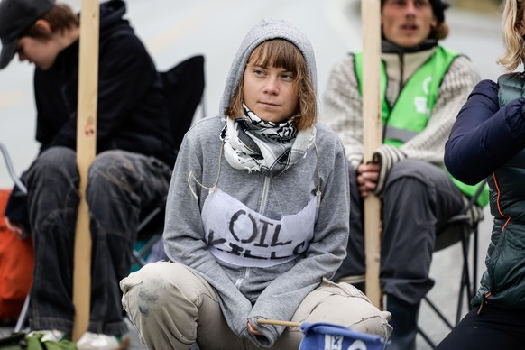 epa12307598 Swedish climate activist Greta Thunberg joins activists from Extinction Rebellion during an action at Equinor&#039;s oil refinery in Mongstad, Norway, 18 August 2025. The global environmen ...
