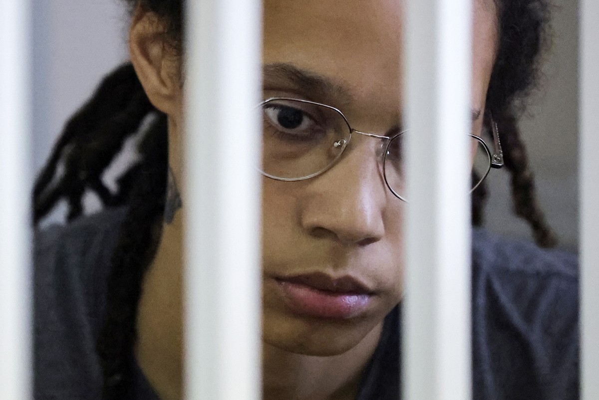 epa10105841 US basketball player Brittney Griner sits inside a defendants' cage before the court's verdict at Khimki City court outside Moscow, Russia, 04 August 2022. The Khimki City Court  ...
