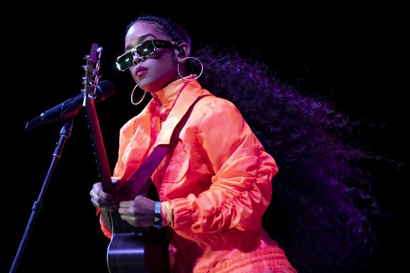 epa07520907 US singer H.E.R. performs on stage during the Coachella Valley Music and Arts Festival in Indio, near Palm Springs, California, USA, 21 April 2019. The festival runs from 12 to 21 April 20 ...