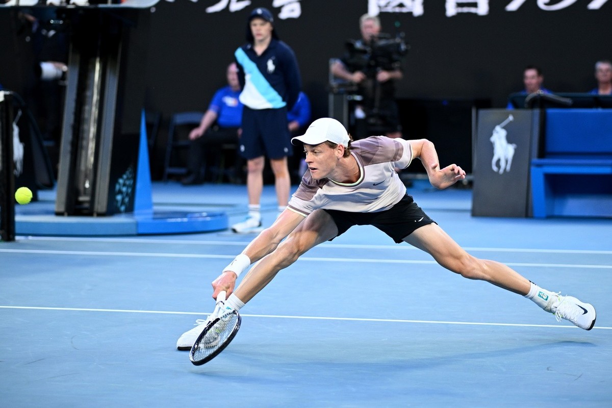 epa11109948 Jannik Sinner of Italy in action during the Men's Singles final against Daniil Medvedev of Russia on Day 15 of the Australian Open tennis tournament in Melbourne, Australia, 28 Januar ...