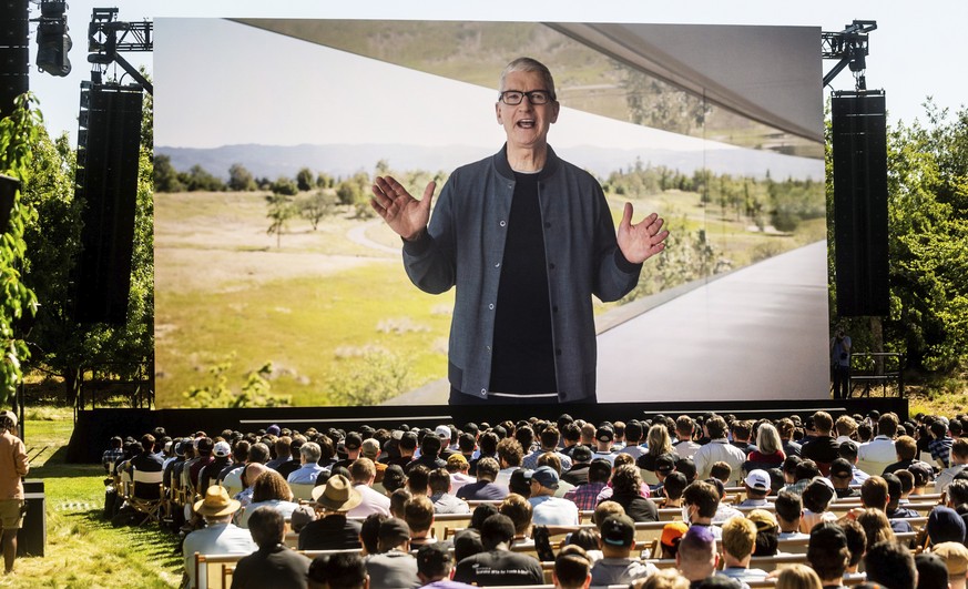 Apple CEO Tim Cook is shown on a video display as he speaks Monday, June 6, 2022, during the keynote presentation of Apple&#039;s World Wide Developer Conference on the campus of Apple&#039;s headquar ...