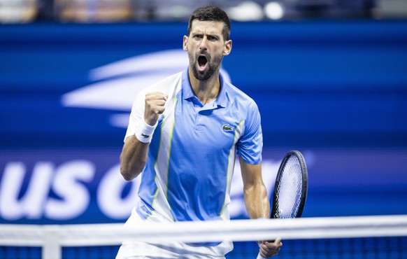 epa10849713 Novak Djokovic of Serbia react to winning a point against Ben Shelton of the United States during their men&#039;s singles semifinal round match during the US Open Tennis Championships at  ...
