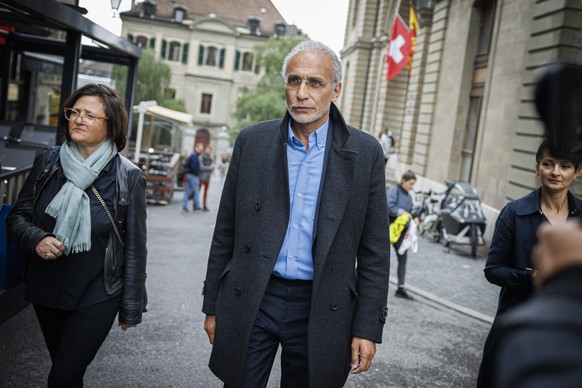 epa11373286 Swiss Islamic scholar Tariq Ramadan (C) leaves the Geneva courthouse with his lawyers Yael Hayat (L) and Nabila Asmane (R) at the start of the appeal trial as part of a sexual assault inve ...