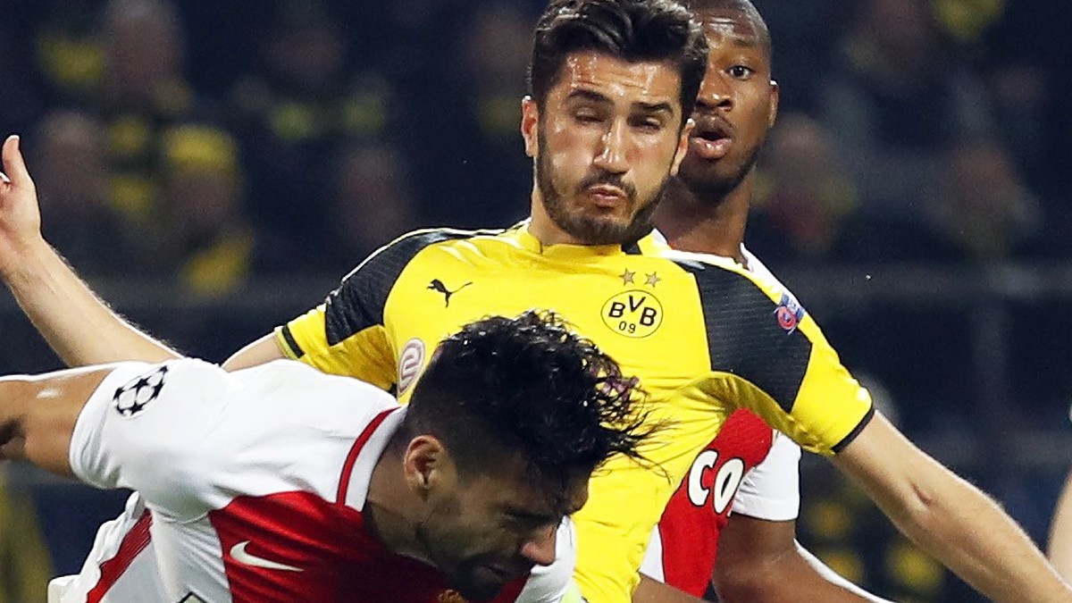 epa05904868 Borussia's Nuri Sahin (2-L) faults Monaco's captains Radamel Falcao (L) during the UEFA Champions League quarter final, first leg soccer match between Borussia Dortmund and AS Mo ...