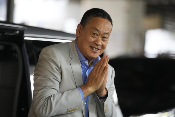 FILE - Thai Prime Minister Srettha Thavisin arrives at Ploenchit market in Bangkok, Thailand, on Aug. 14, 2024. (AP Photo/Sakchai Lalit, File)