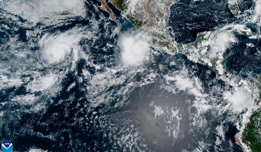 This satellite image provided by NOAA shows Hurricane Polo off the southwestern coast of Mexico and Hurricane Odalys, left, on Thursday, Sept. 24, 2026. (NOAA via AP) CORRECTION: Changes to Hurricane  ...