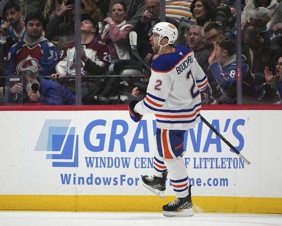 Edmonton Oilers defenseman Evan Bouchard reacts after scoring the winning goal in the third period of an NHL hockey game against the Coloraod Avalanche Thursday, Jan. 16, 2025, in Denver. (AP Photo/Da ...