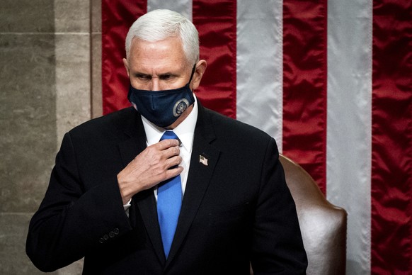 Vice President Mike Pence officiates as a joint session of the House and Senate reconvenes to confirm the Electoral College votes at the Capitol, Wednesday, Jan 6, 2021. (Erin Schaff/The New York Time ...