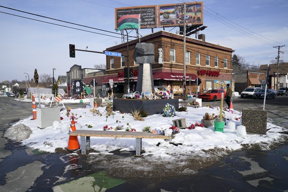 FILE - In this Feb. 8, 2021 file photo, George Floyd Square is shown in Minneapolis. The city of Minneapolis on Friday, March 12, 2021, agreed to pay $27 million to settle a civil lawsuit from George  ...