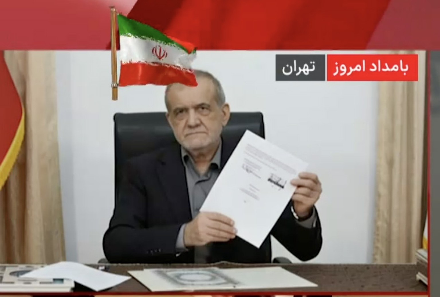 epa13045847 A handout video grab taken from Irans state TV (IRIB) channel shows Iranian President Masoud Pezeshkian (top) shows the Memorandum of Understanding as US president Donald Trump (bottom) s ...