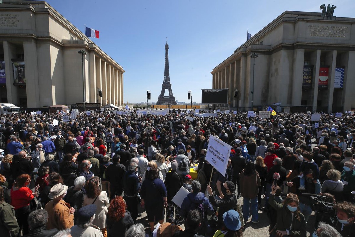 People stage a protest organized by Jewish associations, who say justice has not been done for the killing of French Jewish woman Sarah Halimi, at Trocadero Plaza near Eiffel Tower in Paris, Sunday, A ...
