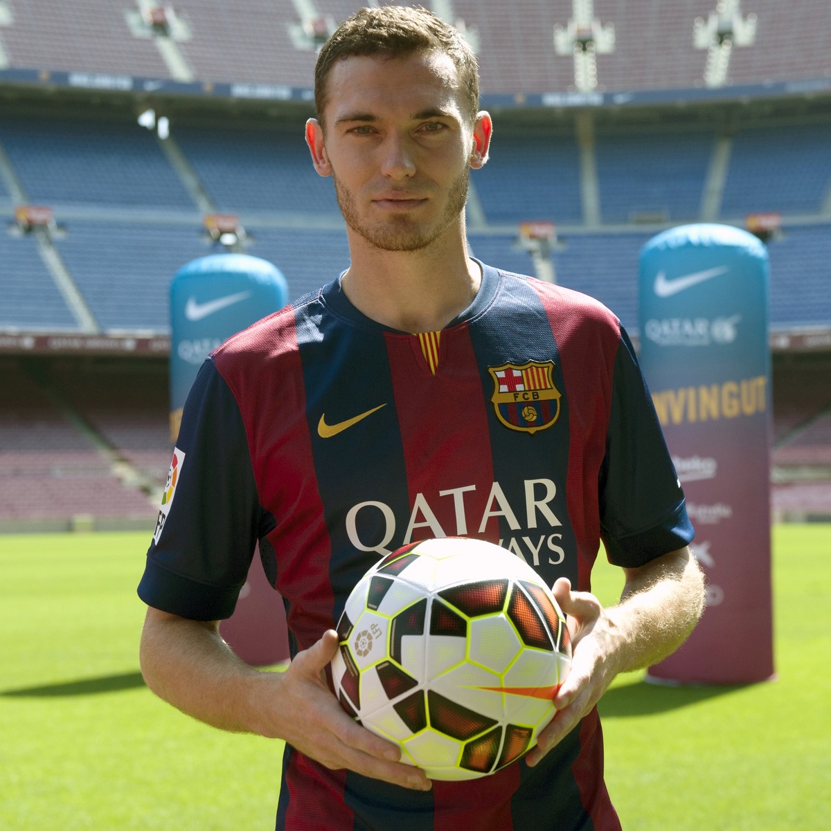 FC Barcelona's new Belgian Thomas Vermaelen poses for the media during his official presentation at the Camp Nou stadium in Barcelona, Spain, Sunday, Aug. 10, 2014. Vermaelen agreed to sign a fiv ...