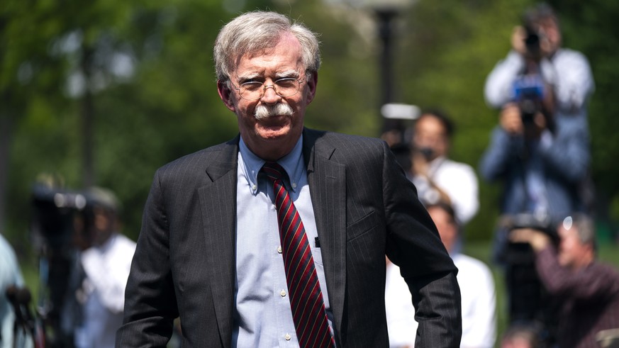 epa07832879 (FILE) - National Security Advisor John Bolton departs after speaking to the media about the uprising in Venezuela outside the West Wing of the White House in Washington, DC, USA, 30 April ...