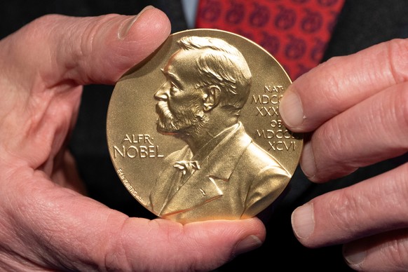 FILE - A close-up view of a Nobel Prize medal at the National Institutes of Health (NIH) in Bethesda, Md., Tuesday, Dec. 8, 2020. (AP Photo/Jacquelyn Martin, File)
Nobel Prize