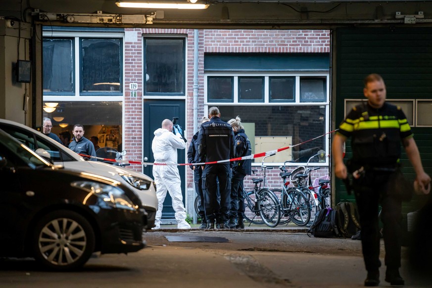 epa09327182 Forensic investigation in the vicinity of the Lange Leidsedwarsstraat in Amsterdam, the Netherlands, 06 July 2021 where crime reporter Peter R. de Vries was seriously injured in a shooting ...