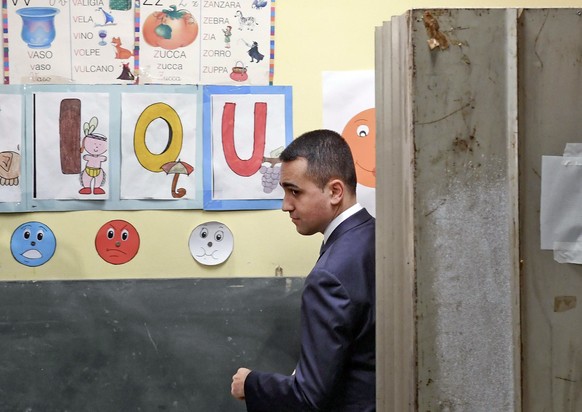 Five-Star Movement and Deputy Prime Minister Luigi Di Maio walks out of a booth after voting for the European Parliament elections at a polling station in Pomigliano D&#039;Arco, near Naples, southern ...