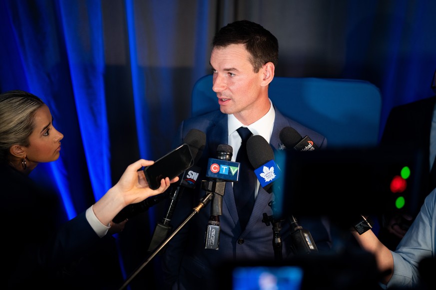 FILE - New Toronto Maple Leafs General Manager John Chayka speaks during a scrum following a news conference in Toronto, May 4, 2026. (Arlyn McAdorey/The Canadian Press via AP, File)
John Chayka