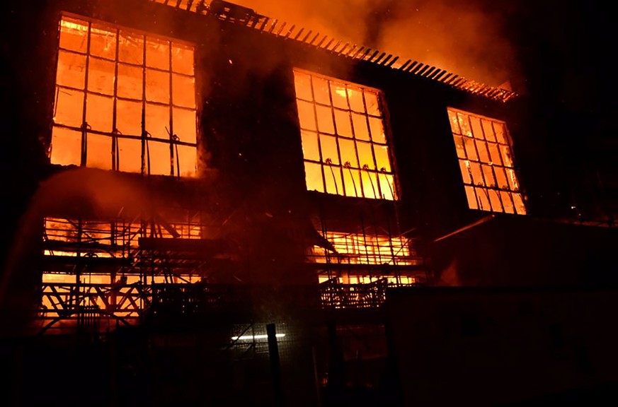 epa06812136 A handout photo made available by the Scottish Fire Service and shown on their Twitter page on 16 June 2018 shows a fire blazing at the Mackintosh Building, housing the Glasgow School of A ...