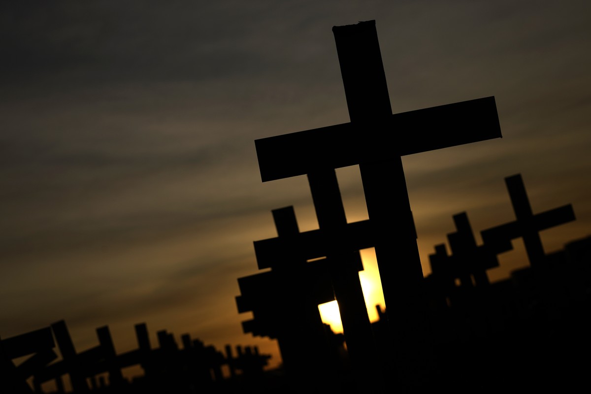 Crosses are placed by representatives of Santas Casas, or religious hospitals, on the Esplanade of Ministries during a protest demanding the government invest more in the country's publicly funde ...