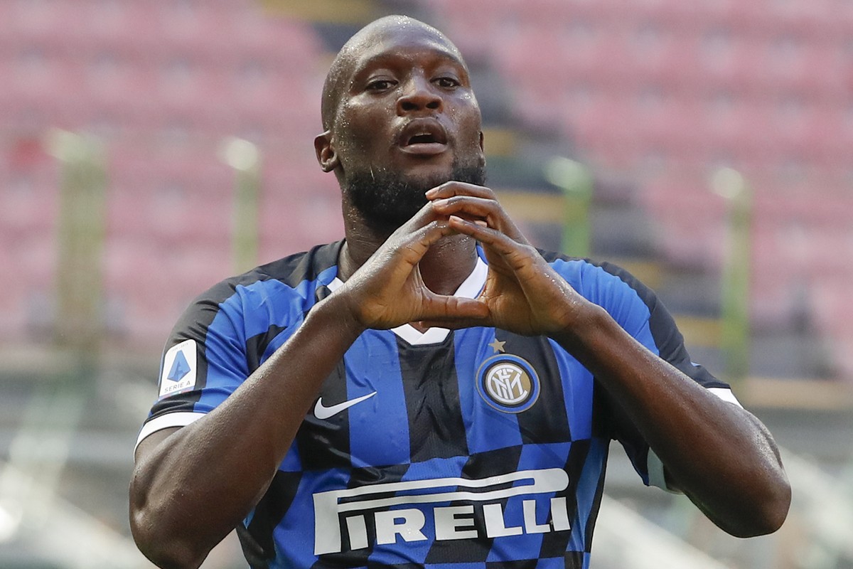 Inter Milan's Romelu Lukaku celebrates after scoring his side's opening goal during the Serie A soccer match between Inter Milan and Bologna at the Milan San Siro Stadium, Italy, Sunday, Jul ...