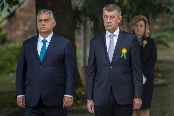 epa09494839 Czech Prime Minister Andrej Babis (R) and his Hungarian counterpart Viktor Orban inspect an honor guard during a welcome ceremony in Prague, Czech Republic, 29 September 2021. Orban is on  ...