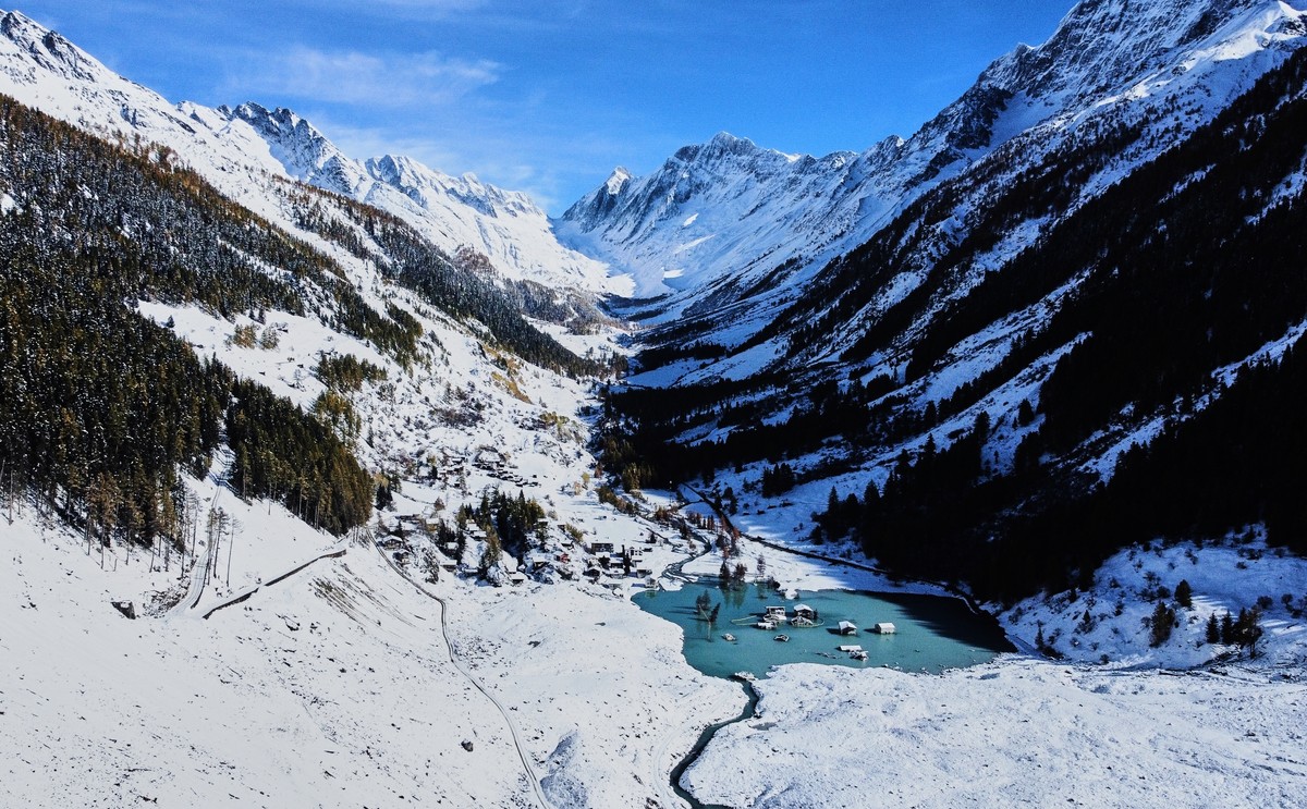 FILE - The partly flooded village of Blatten is visible months after a landslide destroyed the village in Blatten, Switzerland, Oct. 28, 2025. (AP Photo/Michael Probst, File)
Climate COP30
