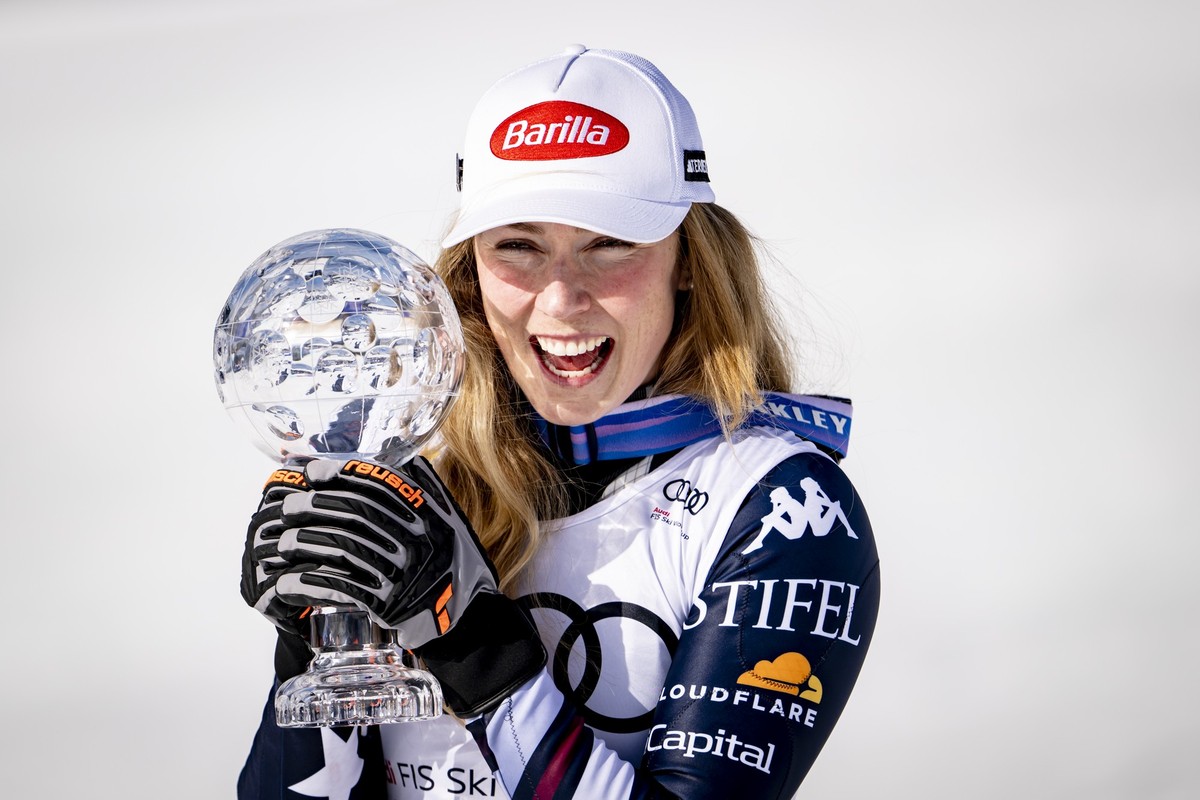 KEYPIX - Mikaela Shiffrin of the United States celebrates with the women's Slalom overall leader crystal globe trophy in the finish area at the Lillehammer FIS Alpine Ski World Cup Finals, in Haf ...