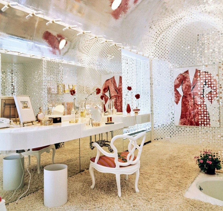 Vogue, October 01, 1971 - The bathroom of philanthropist Jan Cowles, in the New York apartment owned by herself and her husband, publisher Gardner Cowles. The bathtub is sunk into the white shag-carpe ...