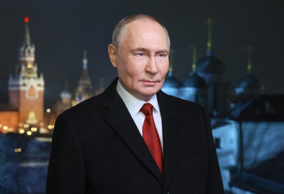 Russian President Vladimir Putin speaks during a recording of his annual televised New Year's message on New Year's eve in the Kremlin in Moscow, on Wednesday, Dec. 31, 2025. (Mikhail Metzel ...