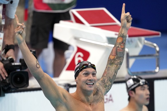 Caeleb Dressel of the United States celebrates winning the men&#039;s 100-meter freestyle final at the 2020 Summer Olympics, Thursday, July 29, 2021, in Tokyo, Japan. (AP Photo/Matthias Schrader)
Cael ...