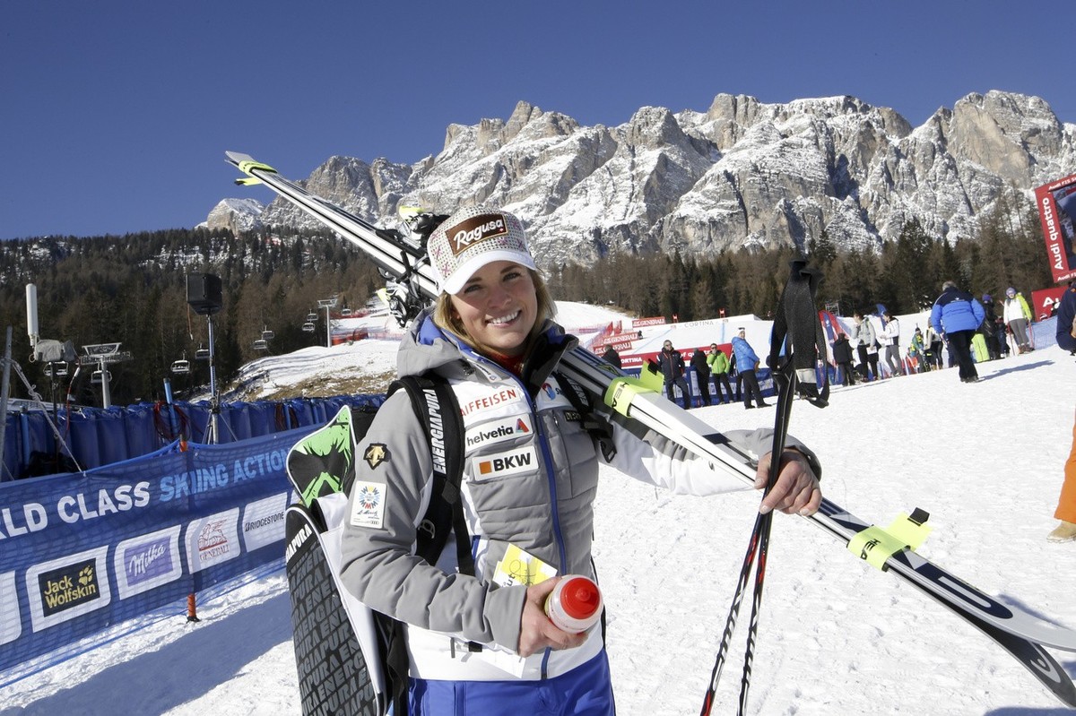 Lara Gut, of Switzerland, smiles in the finish area after completing a training session for an alpine ski, women's World Cup downhill, in Cortina D'Ampezzo, Italy, Friday, Jan. 22, 2016. (AP ...